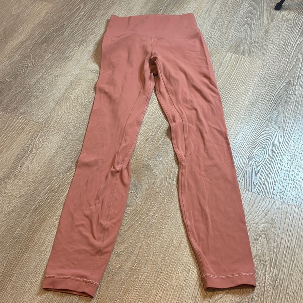 Lululemon rhythm High Rise‎ Leggings Pale Orange size 2 inseam 24 stains A8